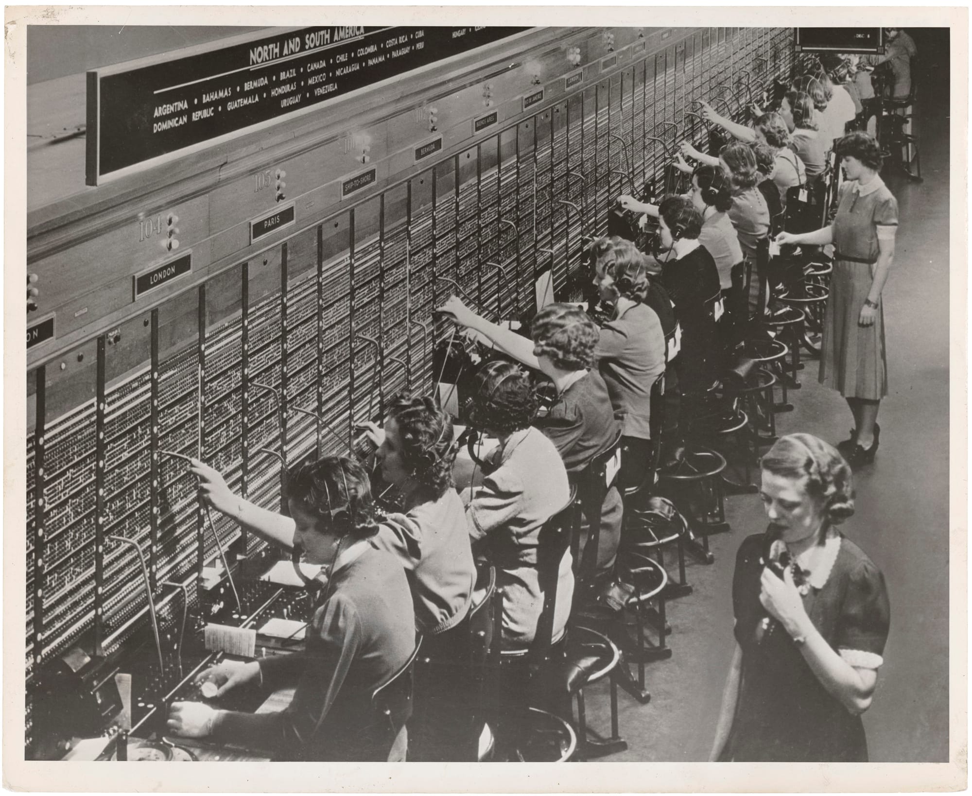 Photograph of Women Working at a Bell System international Telephone Switchboard